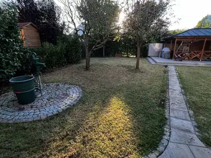 Derselbe Garten vor und nach dem Pflegetermin – nachher